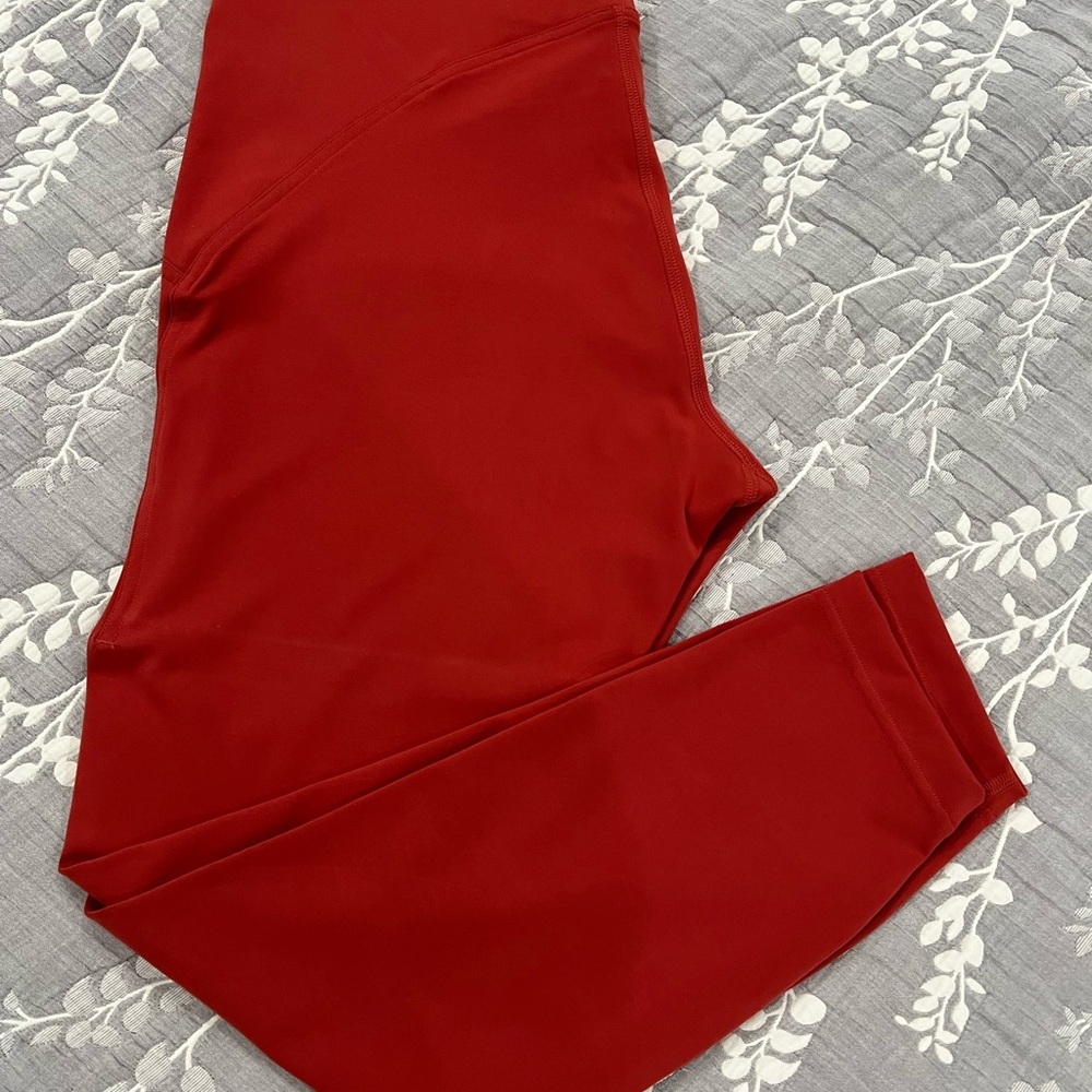 lululemon Leggings, color burnt red/orange, size 12. TAG WAS CUT OFF.